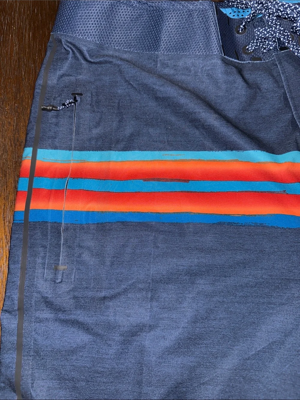 Rip Curl Mirage Mick Fanning Navy Board Shorts with Red & Aqua Stripes 34